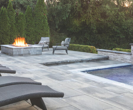 Pool with patio using Nueva XL Slab products from Oaks Landscape Products